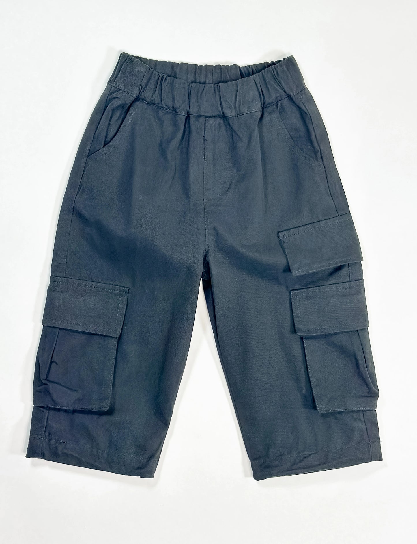 black baggy pants with large front pockets and elastic waistband on white backgrounds – comfortable and stylish streetwear by Little Aurel
