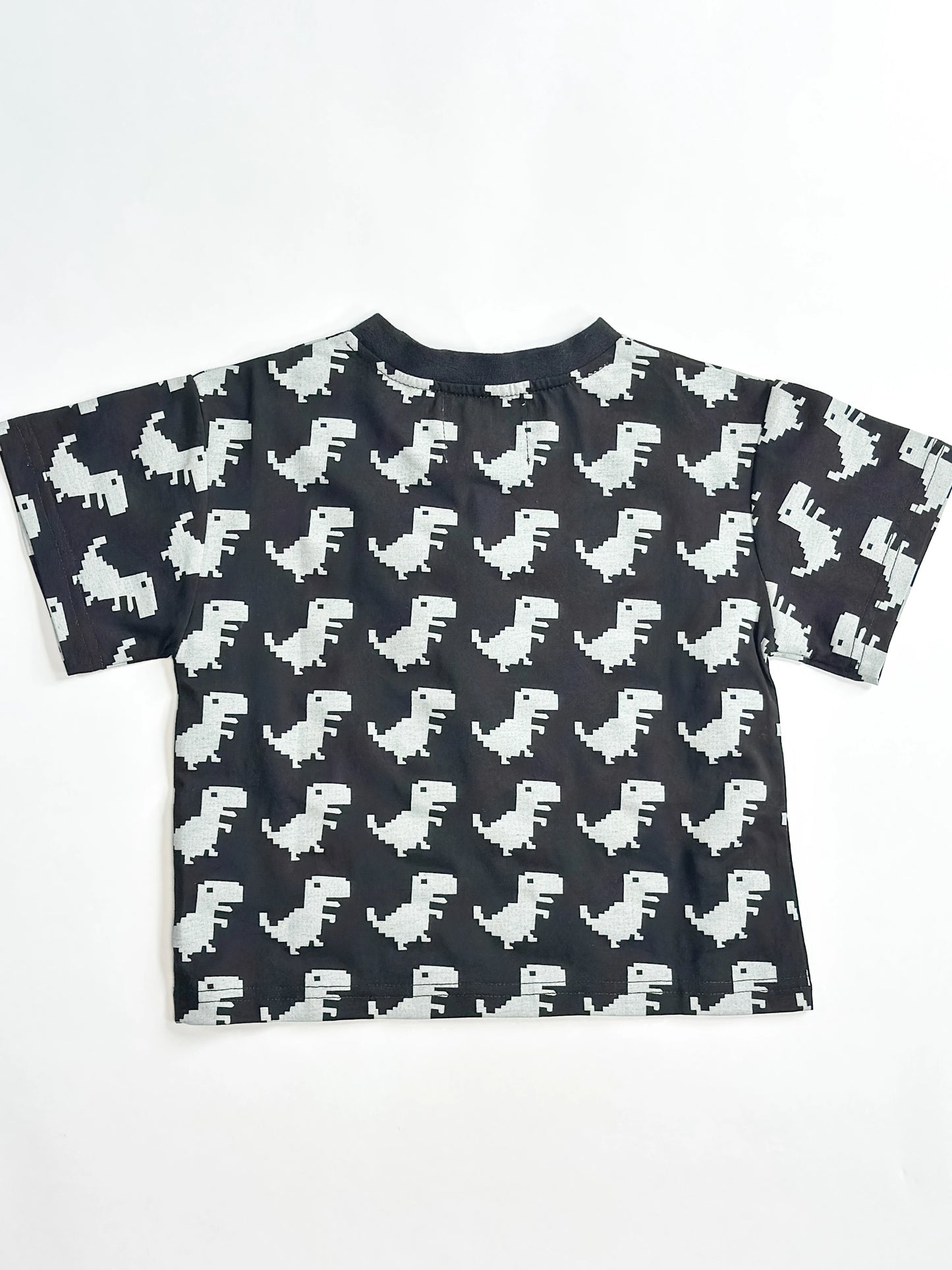 Black toddler boys’ t-shirt with bold grey dinosaur graphic prints – soft cotton, cool streetwear look by Little Aurel