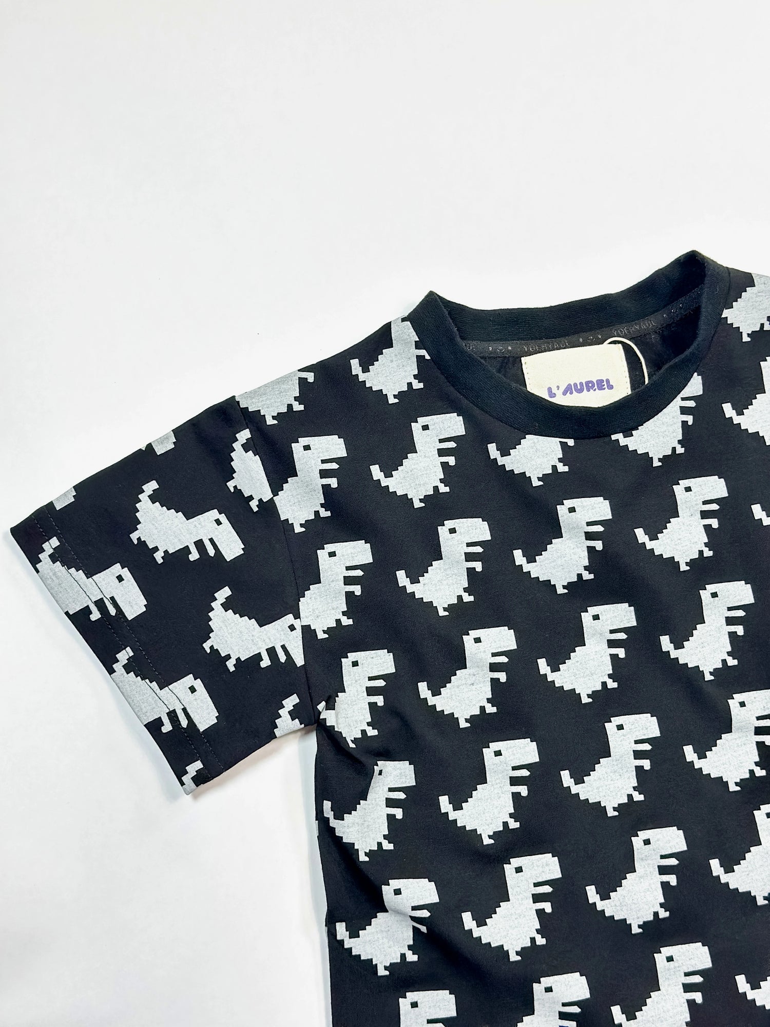 Black toddler boys’ t-shirt with bold grey dinosaur graphic prints – soft cotton, cool streetwear look by Little Aurel