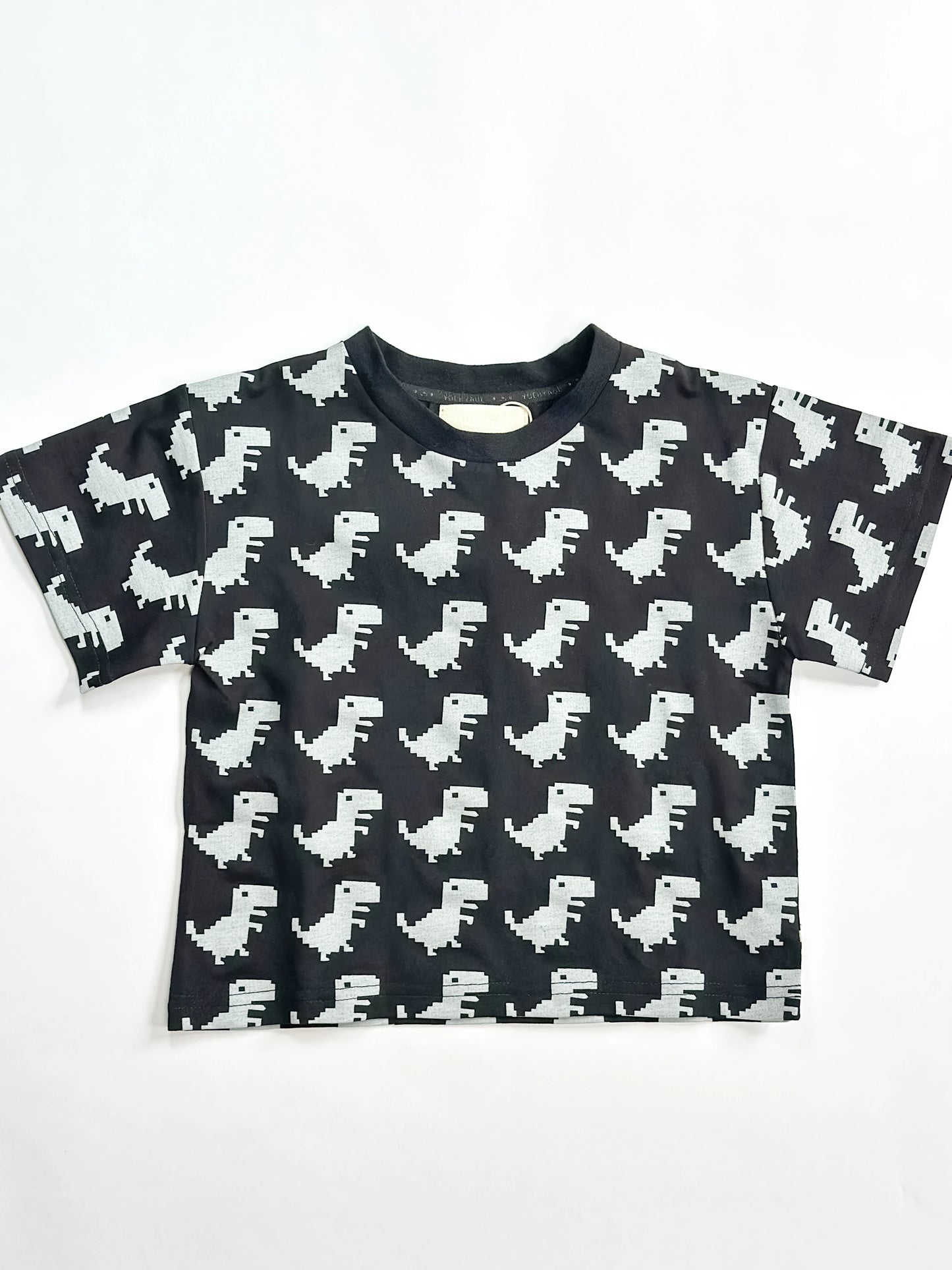 Black toddler boys’ t-shirt with bold grey dinosaur graphic prints – soft cotton, cool streetwear look by Little Aurel