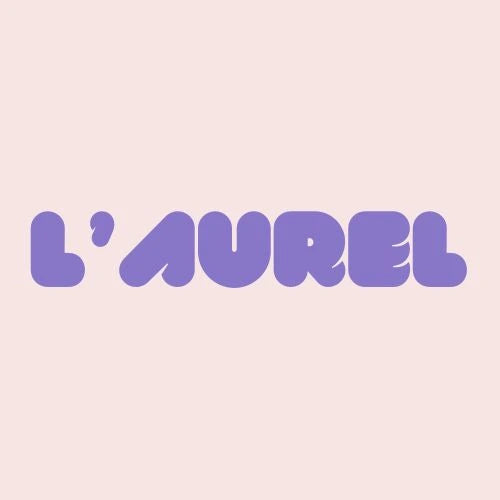 Purple 'L'Aurel' logo on a light pink background