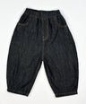 Black barrel-fit denim pants for toddler boys with contrast yellow stitching and wide relaxed cut by Little Aurel.