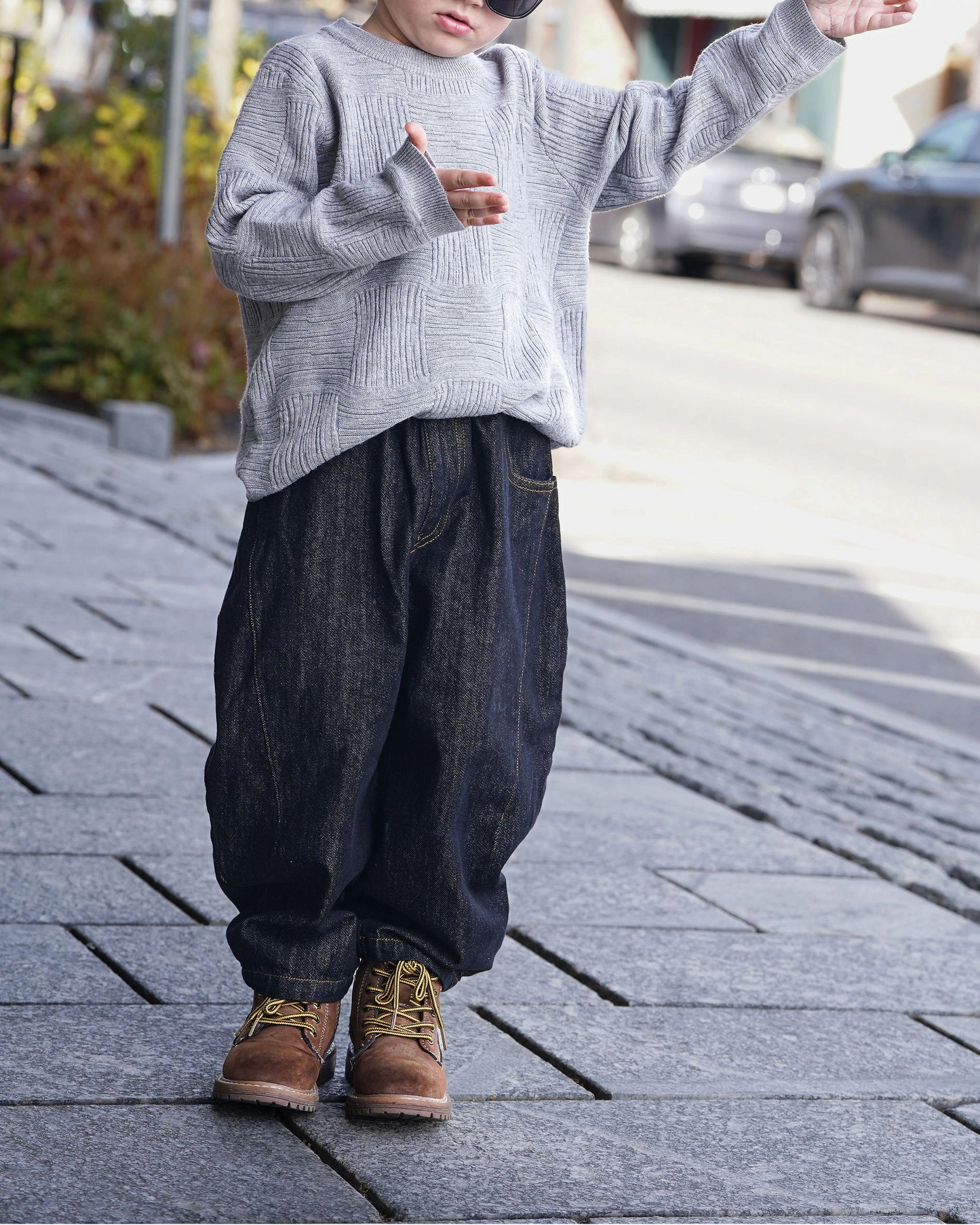 Gray cross-texture knit sweater for toddler boys with ribbed details and relaxed fit by Little Aurel.