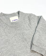 Gray cross-texture knit sweater for toddler boys with ribbed details and relaxed fit by Little Aurel.