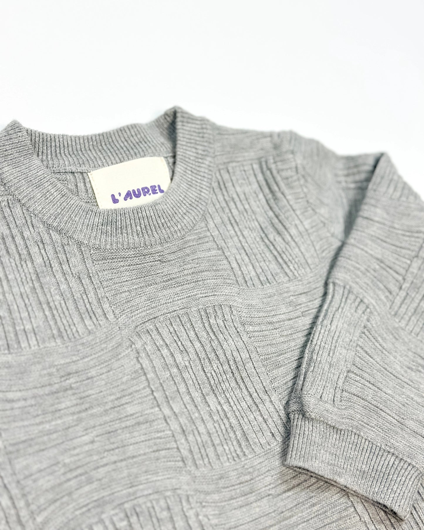 Gray cross-texture knit sweater for toddler boys with ribbed details and relaxed fit by Little Aurel.