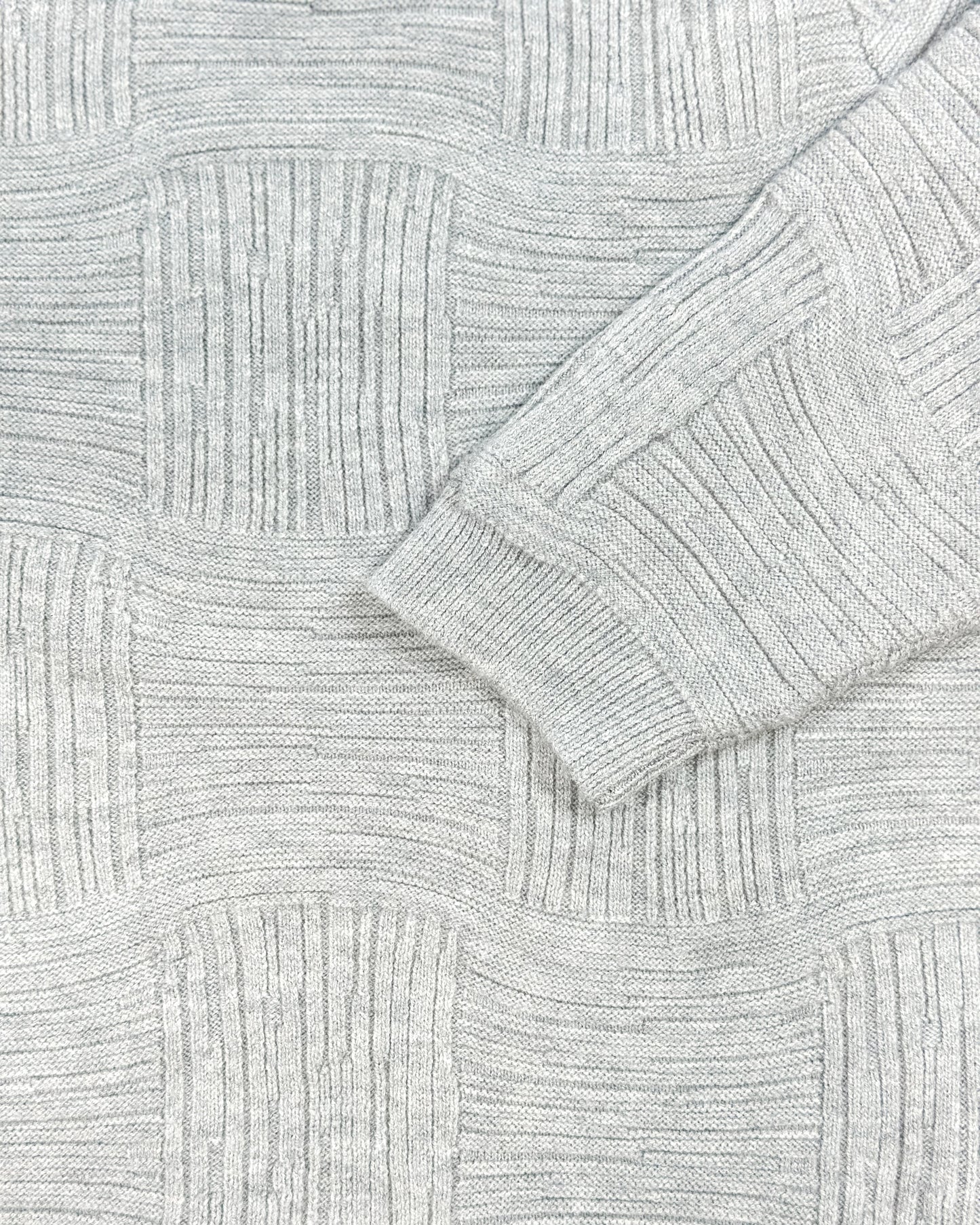 Close-up of a textured fabric with geometric pattern