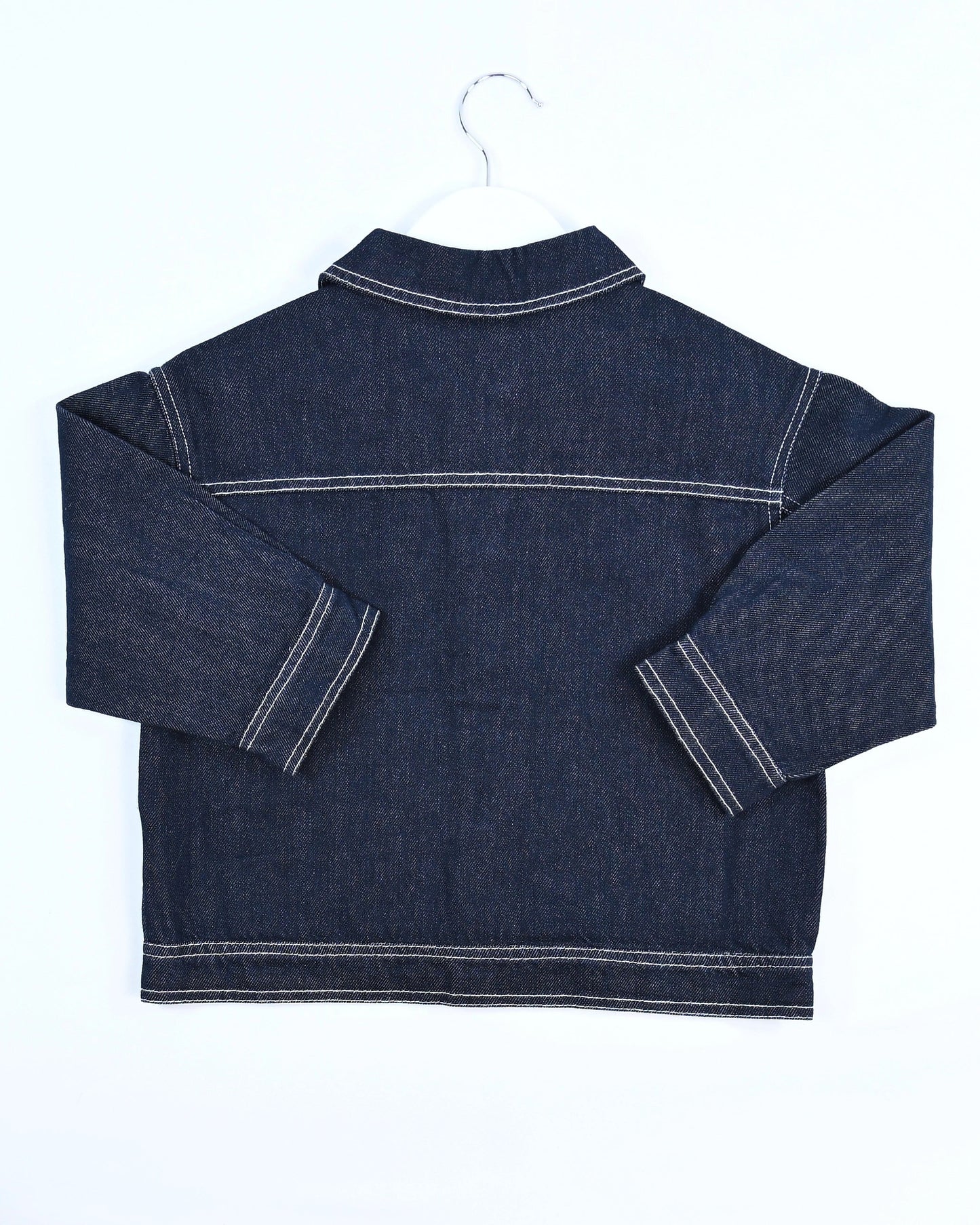 Dark blue denim jacket for toddler boys with front pocket details, silver buttons, and “Good Boy” embroidery by Little Aurel.