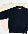 Cream and Black colored knit pullover for toddler boys  by Little Aurel.