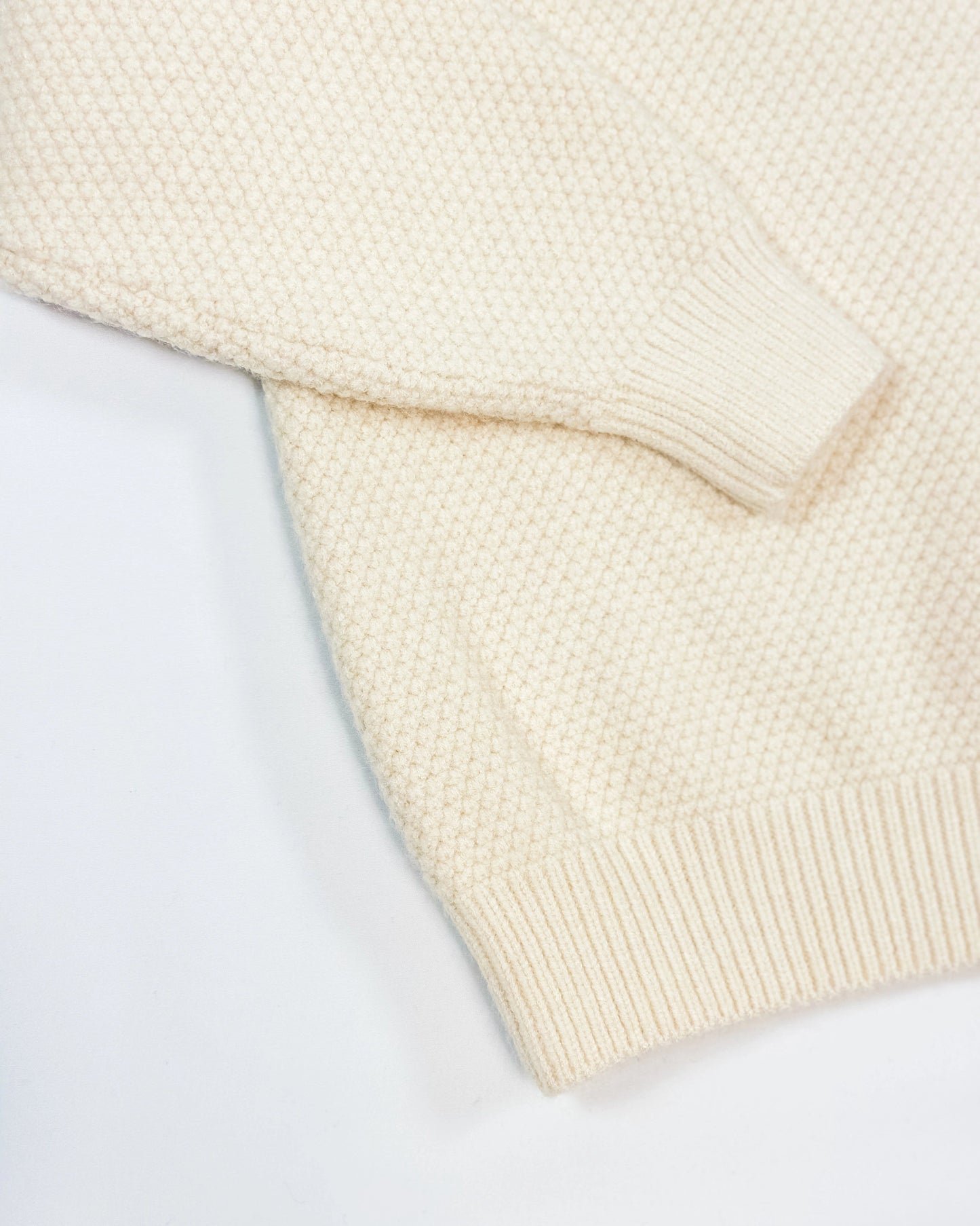 Cream knit pullover for toddler boys  by Little Aurel.