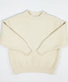 Cream knit pullover for toddler boys by Little Aurel.