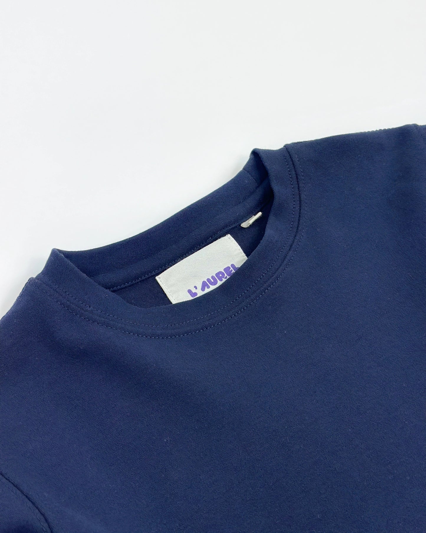 Loose-fit longsleeve shirt for kids in navy blue with small dinosaur embroidery