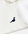 Loose-fit longsleeve shirt for kids in white with small dinosaur embroidery