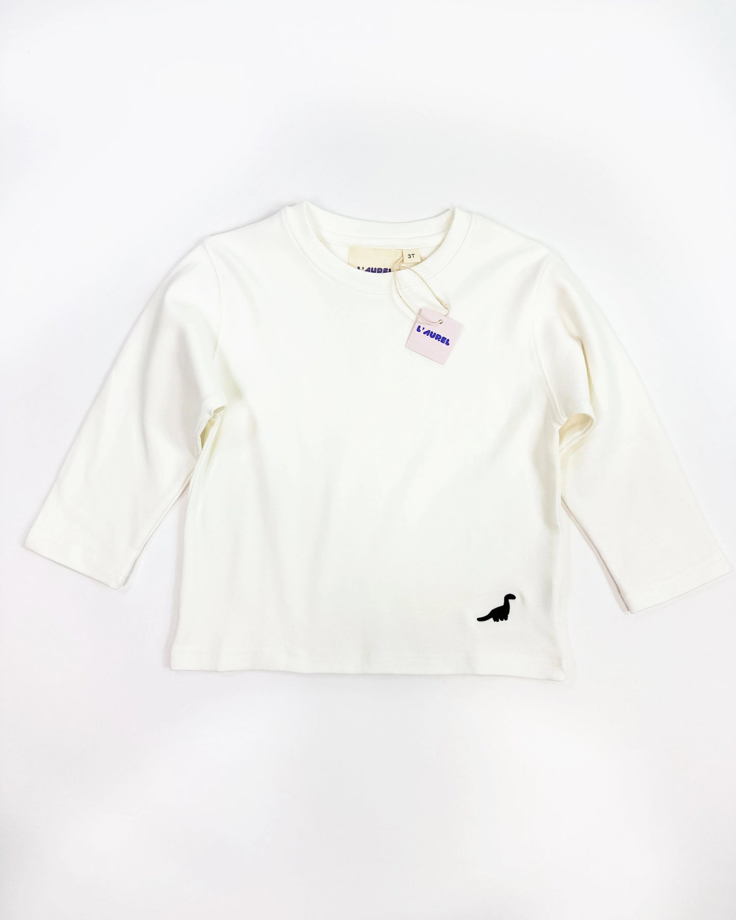 Loose-fit longsleeve shirt for kids in white with small dinosaur embroidery