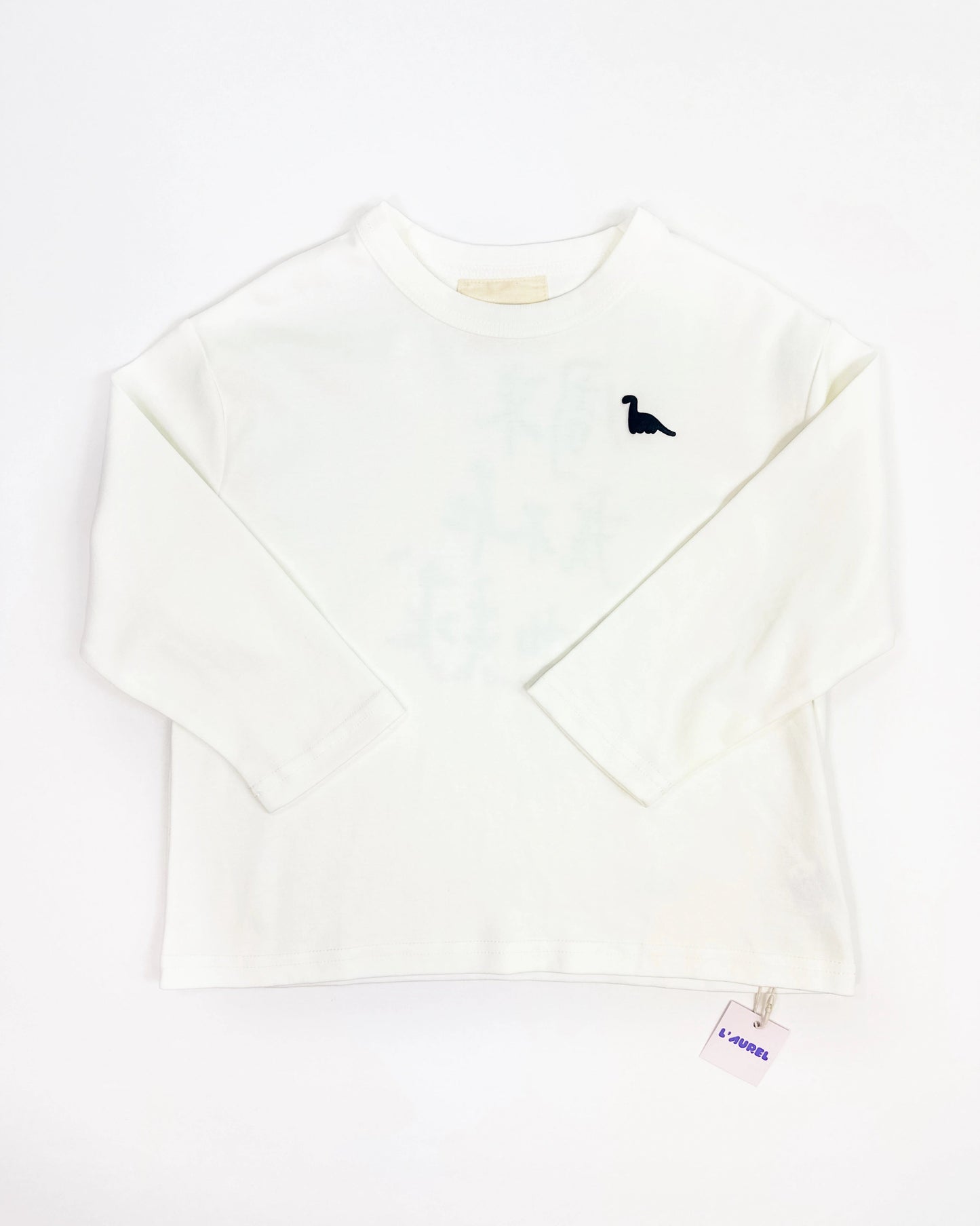 Oversized graphic longsleeve for kids in white with back print and small dinosaur detail