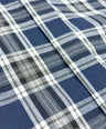 Close-up of blue and gray plaid fabric