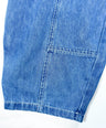 Signature denim pants for toddler boys in blue washed look with wide barrel fit and deep front pockets by Little Aurel.