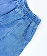 Signature denim pants for toddler boys in blue washed look with wide barrel fit and deep front pockets by Little Aurel.