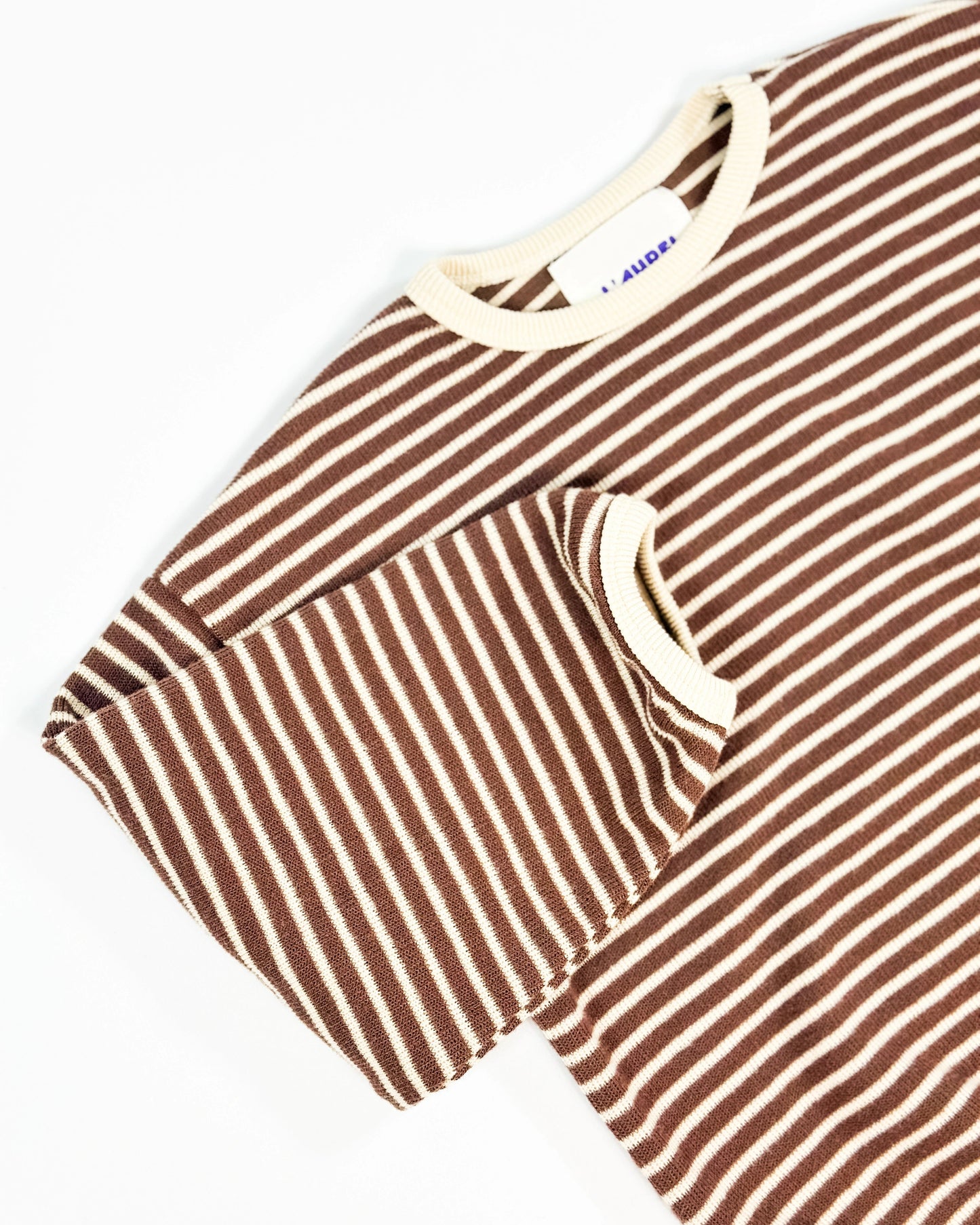 Brown and white striped knit pullover for toddler boys with cream neckline and cuffs by Little Aurel