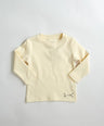 Creme long-sleeve shirt on a light gray background by L'aurel