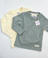 Two children's longsleeves, one beige and one gray, on a light gray background by L'aurel